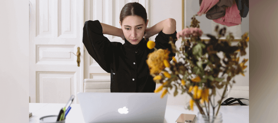 A photographer working at her computer