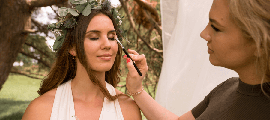 Makeup artist doing a bride's makeup