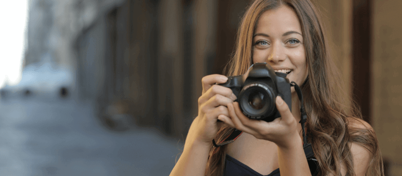 Happy photographer who followed Aftershoot's photography workflow tips