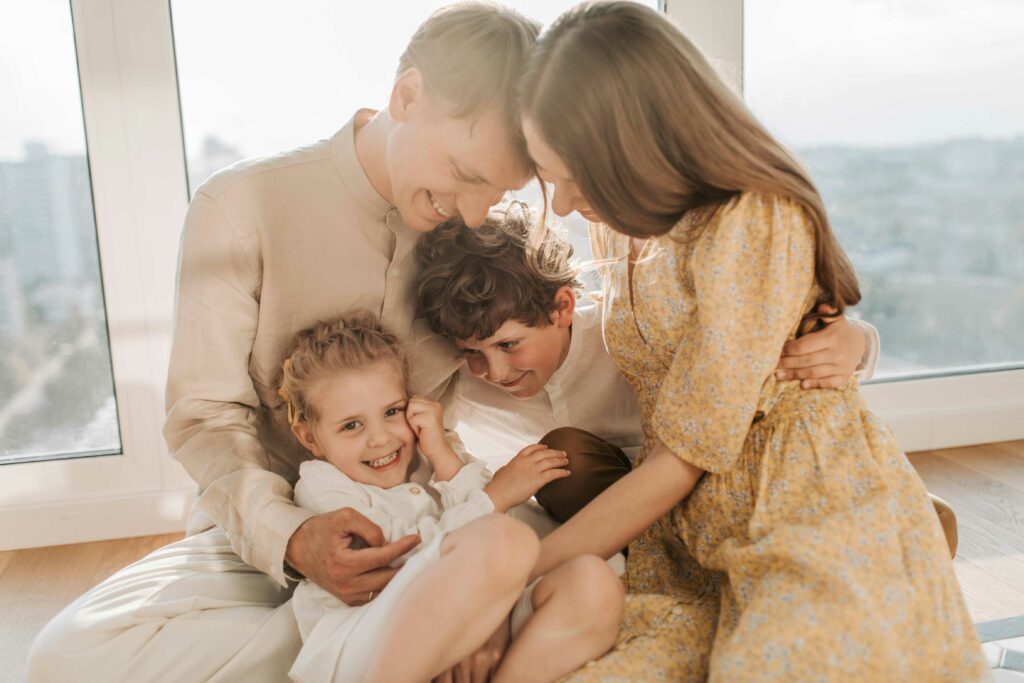 family photoshoot using sandwich method