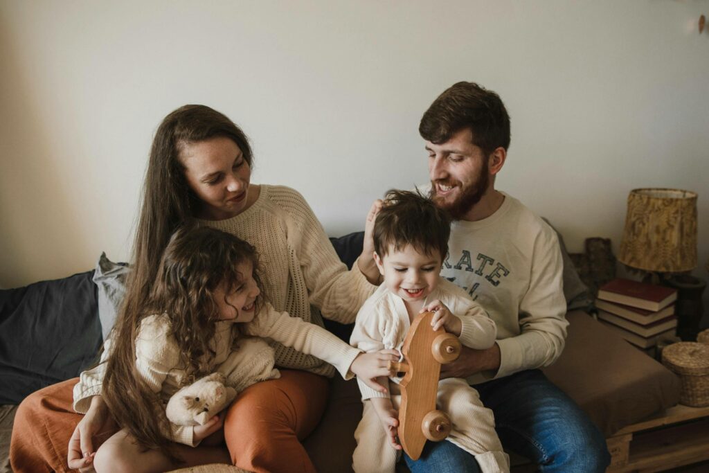Everyone looking at the baby, working as an anchor for family portrait