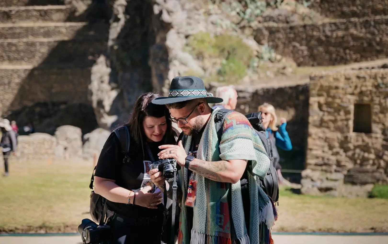 friends-checking-camera-photos-after-shooting